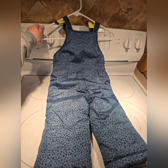 Bright Blue Puffer Jacket with Yellow Accents - Picture 7 of 9